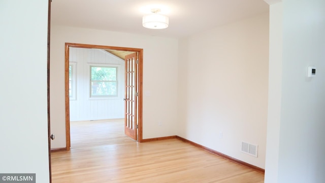 6007 Vincent Ave N, Brooklyn Center, MN 55430 - hall featuring light wood-style floors and baseboards
