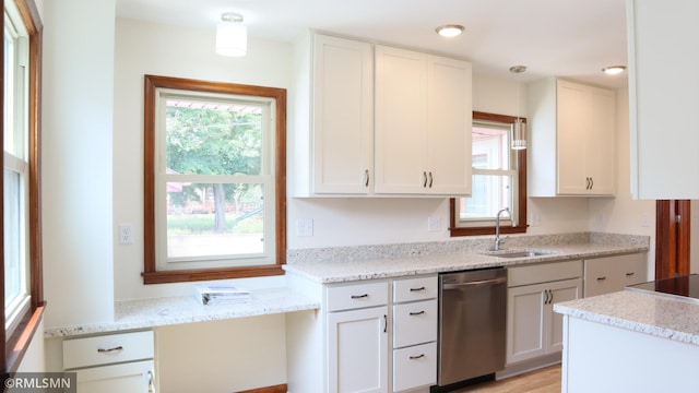 6007 Vincent Ave N, Brooklyn Center, MN 55430 - kitchen featuring dishwasher, white cabinets, hanging light fixtures, and light stone countertops