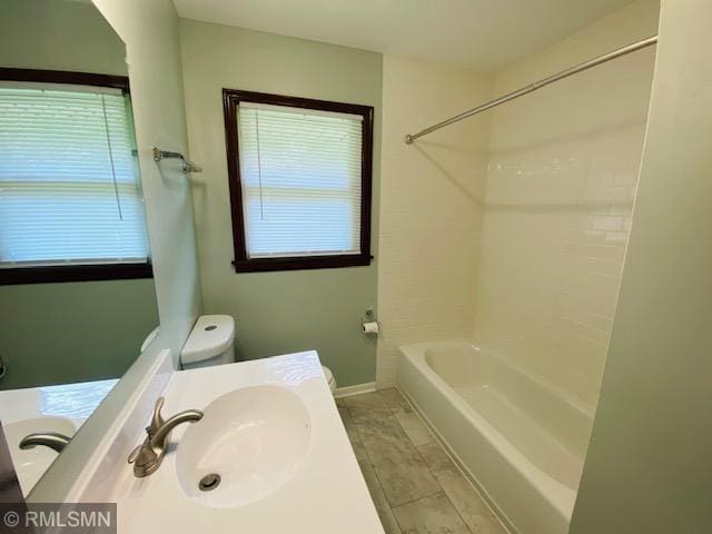 6007 Vincent Ave N, Brooklyn Center, MN 55430 - full bathroom featuring vanity and bathing tub / shower combination