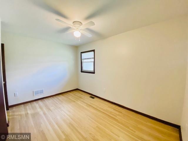 6007 Vincent Ave N, Brooklyn Center, MN 55430 - unfurnished room with ceiling fan and light wood finished floors