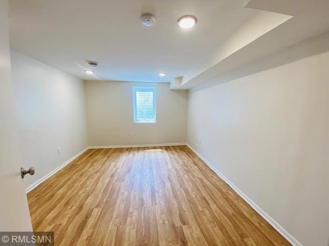 6007 Vincent Ave N, Brooklyn Center, MN 55430 - empty room featuring light wood-type flooring and baseboards