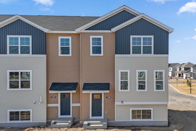 2700 Kepler Ave NE, Saint Michael, MN 55376 - view of front of house with a shingled roof and board and batten siding