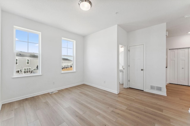 2700 Kepler Ave NE, Saint Michael, MN 55376 - unfurnished bedroom with light wood-type flooring and baseboards