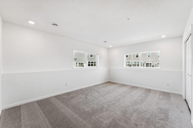 2700 Kepler Ave NE, Saint Michael, MN 55376 - carpeted empty room with recessed lighting and a textured ceiling
