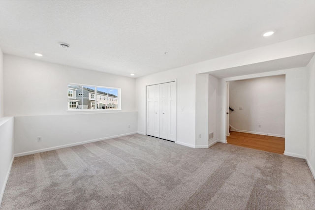 2700 Kepler Ave NE, Saint Michael, MN 55376 - unfurnished bedroom featuring carpet floors, recessed lighting, and a closet