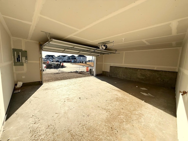2700 Kepler Ave NE, Saint Michael, MN 55376 - garage featuring electric panel and a garage door opener