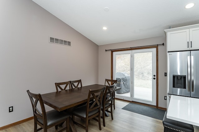 3415 Lake St NW, Rochester, MN 55901 - dining space featuring lofted ceiling, light wood finished floors, and recessed lighting