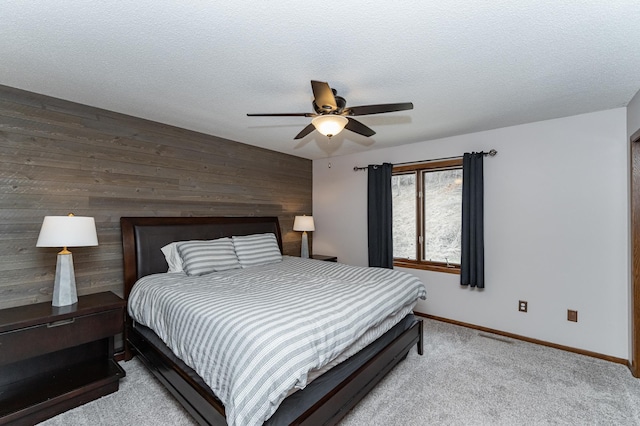 3415 Lake St NW, Rochester, MN 55901 - bedroom featuring carpet flooring, wood walls, and ceiling fan