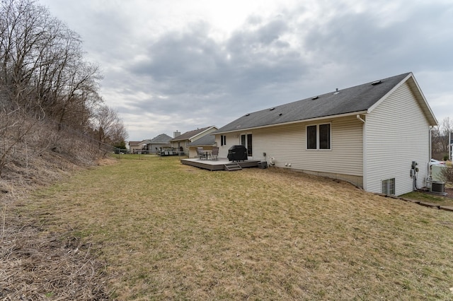 3415 Lake St NW, Rochester, MN 55901 - back of house with a deck, a yard, and roof with shingles