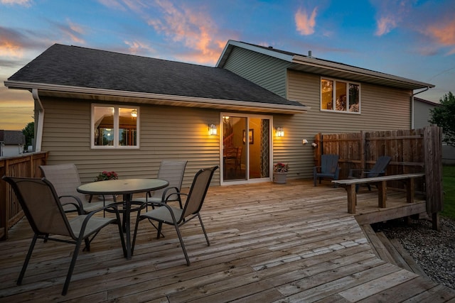 133 Uriah Ct, Mankato, MN 56001 - deck at dusk featuring outdoor dining area