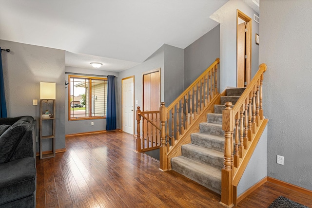 133 Uriah Ct, Mankato, MN 56001 - entryway with wood finished floors, a textured wall, and stairway