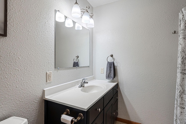 133 Uriah Ct, Mankato, MN 56001 - bathroom featuring vanity and a textured wall