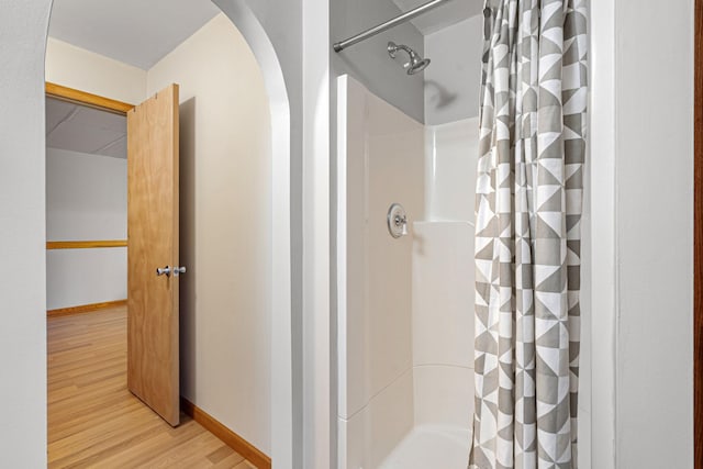 133 Uriah Ct, Mankato, MN 56001 - full bath with a shower with curtain and wood finished floors