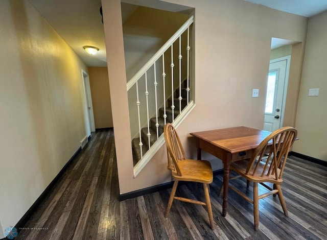 319 13th St N, Moorhead, MN 56560 - dining area featuring wood finished floors and stairs