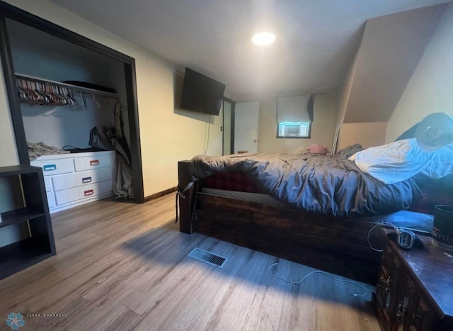 319 13th St N, Moorhead, MN 56560 - bedroom with wood finished floors and baseboards