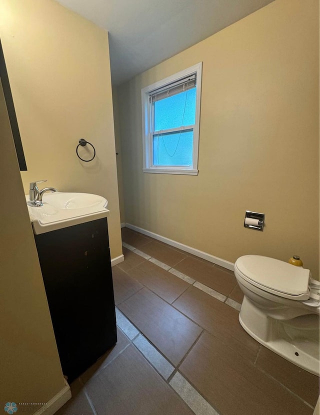 319 13th St N, Moorhead, MN 56560 - bathroom featuring vanity and tile patterned flooring
