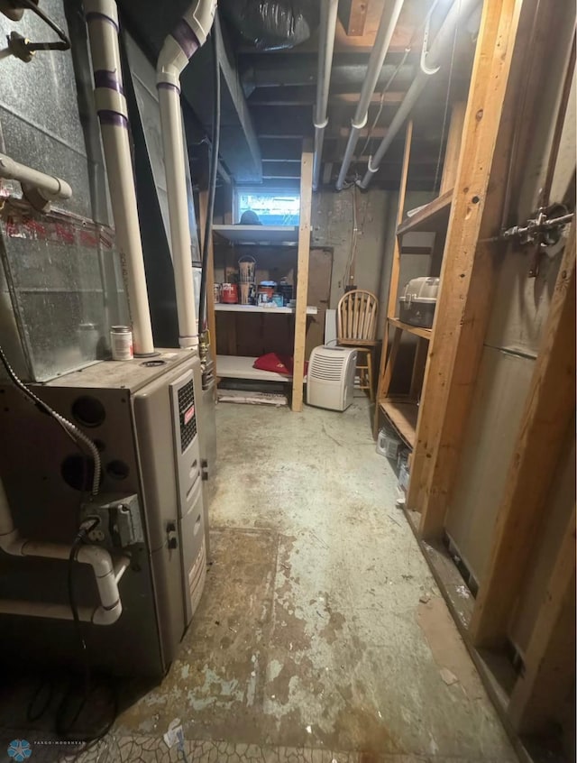 319 13th St N, Moorhead, MN 56560 - unfinished below grade area featuring heating unit