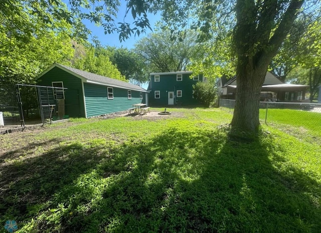 319 13th St N, Moorhead, MN 56560 - view of yard with a fire pit