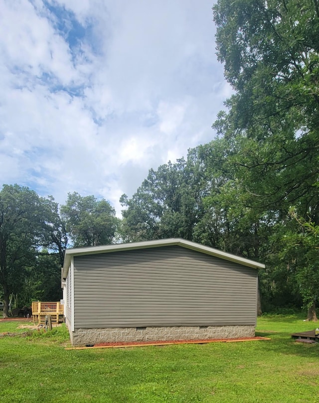 4247 Crow Wing Cir SW, Sylvan Twp, MN 56473 - view of side of home with crawl space, a lawn, and a deck
