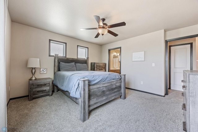 5543 Tuscan Ct S, Fargo, ND 58104 - bedroom featuring light colored carpet, ensuite bathroom, and ceiling fan
