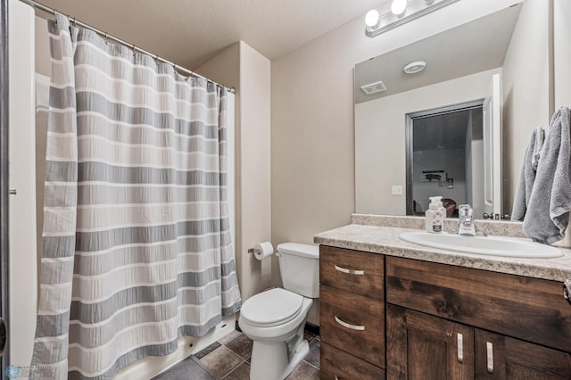 5543 Tuscan Ct S, Fargo, ND 58104 - full bath featuring vanity, tile patterned flooring, curtained shower, and a textured ceiling