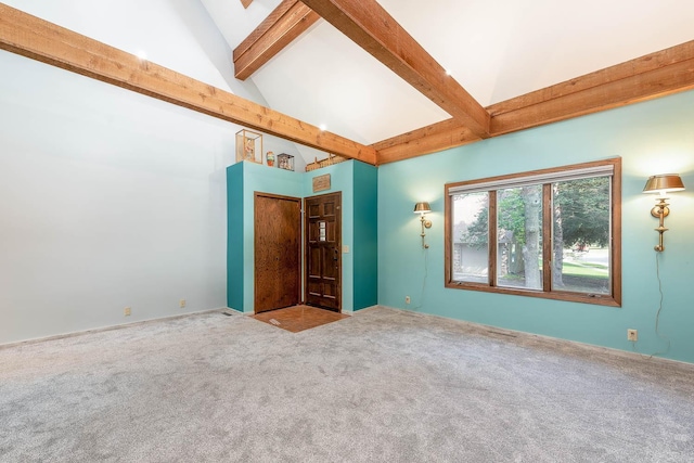 1607 Pleasant View Dr, North Mankato, MN 56003 - empty room featuring high vaulted ceiling, beam ceiling, and carpet flooring