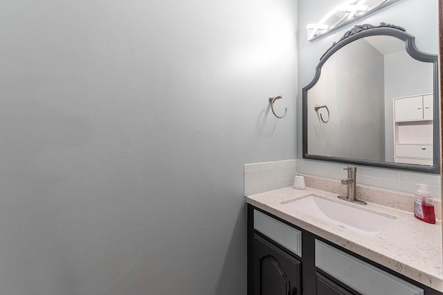 1607 Pleasant View Dr, North Mankato, MN 56003 - bathroom with decorative backsplash and vanity