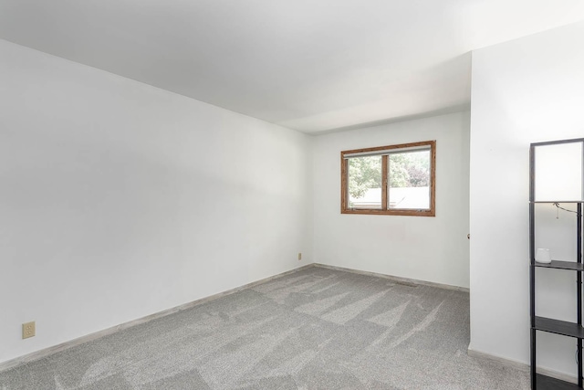 1607 Pleasant View Dr, North Mankato, MN 56003 - carpeted spare room with baseboards