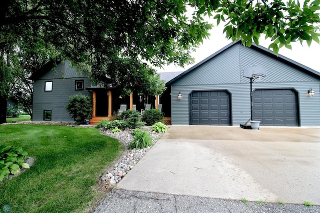 1307 Libra Ln, Fargo, ND 58104 - view of front facade featuring an attached garage, a front yard, and concrete driveway