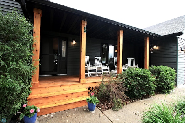 1307 Libra Ln, Fargo, ND 58104 - doorway to property with a porch and roof with shingles