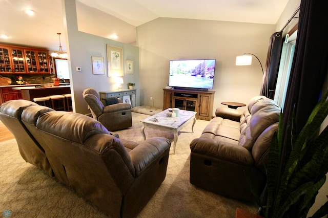 1307 Libra Ln, Fargo, ND 58104 - carpeted living area featuring vaulted ceiling