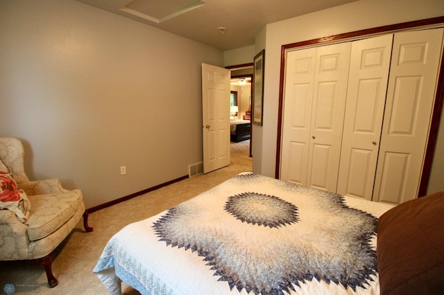 1307 Libra Ln, Fargo, ND 58104 - bedroom with light carpet, attic access, and a closet