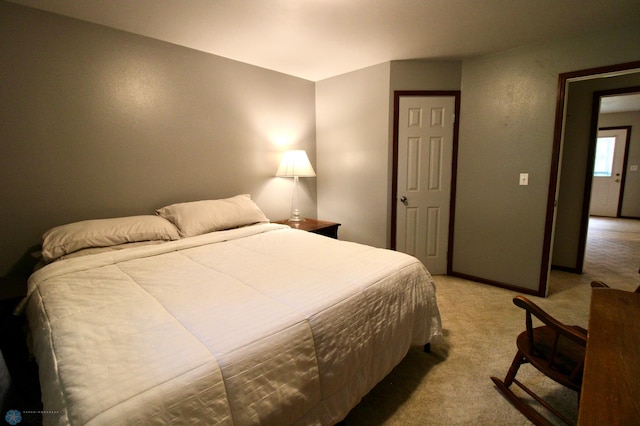 1307 Libra Ln, Fargo, ND 58104 - bedroom featuring light carpet and baseboards