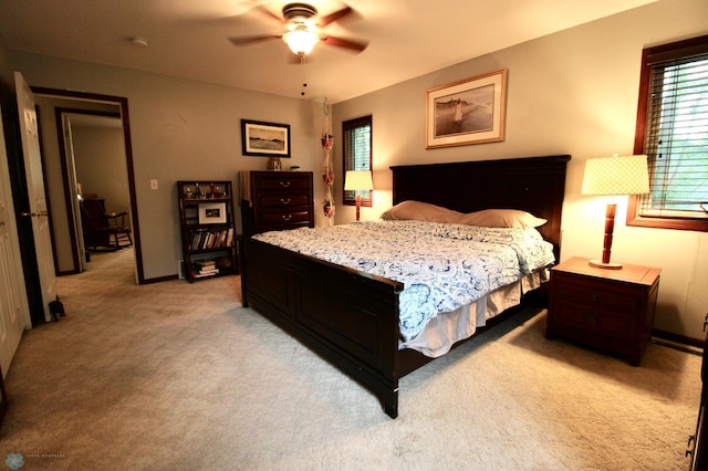 1307 Libra Ln, Fargo, ND 58104 - bedroom featuring light carpet and a ceiling fan