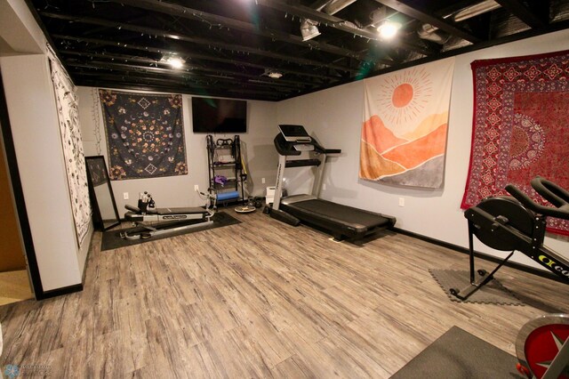 1307 Libra Ln, Fargo, ND 58104 - exercise room with wood finished floors