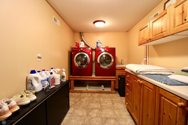 1307 Libra Ln, Fargo, ND 58104 - washroom with cabinet space and washer and dryer