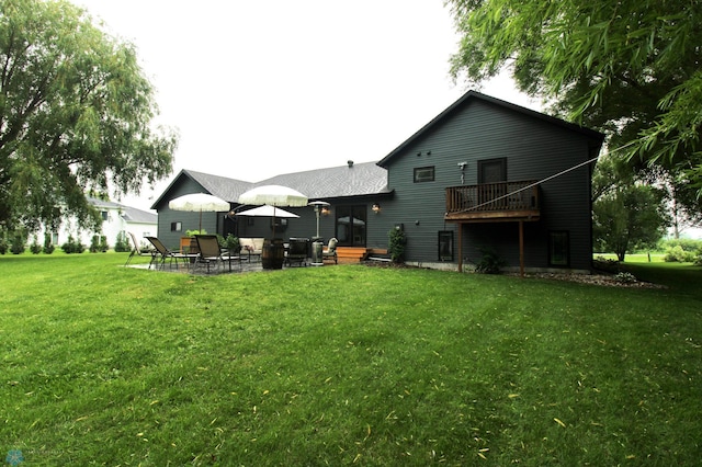 1307 Libra Ln, Fargo, ND 58104 - rear view of house featuring a yard and a patio