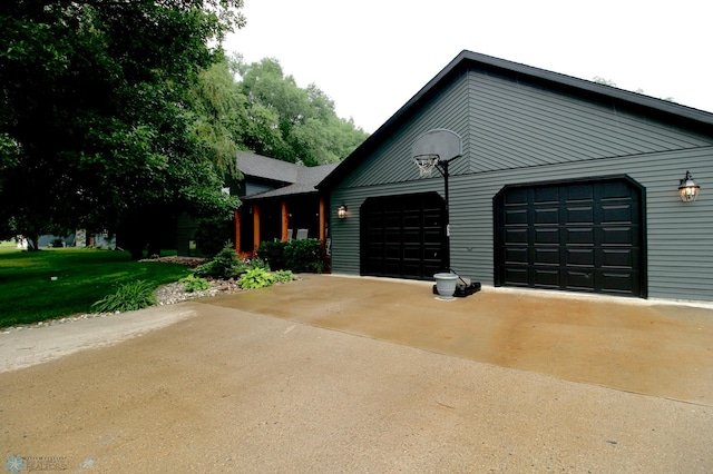 1307 Libra Ln, Fargo, ND 58104 - view of front of house with a garage, concrete driveway, and a front yard