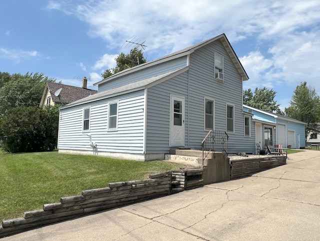 208 Benton St W, Cologne, MN 55322 - view of front of house featuring a front lawn and entry steps
