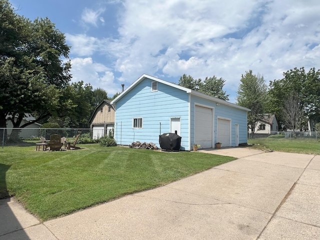 208 Benton St W, Cologne, MN 55322 - view of property exterior with a detached garage