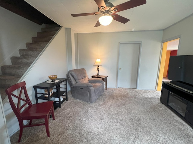 208 Benton St W, Cologne, MN 55322 - living area featuring carpet floors, stairs, and ceiling fan