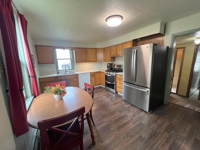208 Benton St W, Cologne, MN 55322 - kitchen with stainless steel appliances, dark wood finished floors, and light countertops
