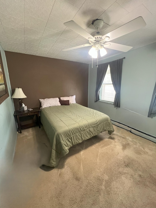 208 Benton St W, Cologne, MN 55322 - carpeted bedroom with a baseboard radiator and a ceiling fan