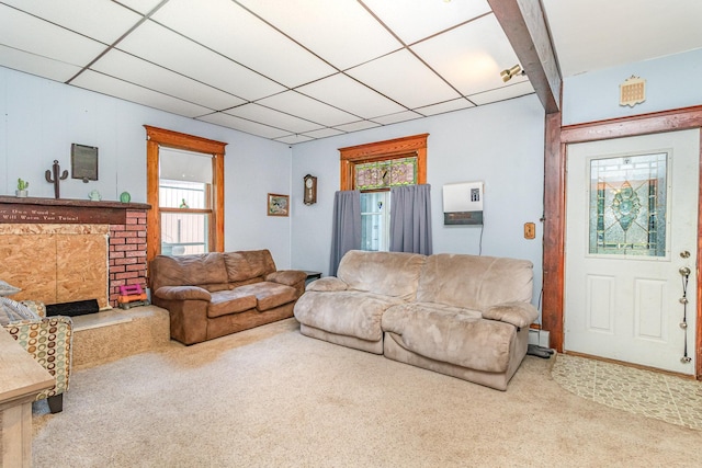 41793 Kilkenny Rd, Kilkenny, MN 56052 - living room featuring carpet flooring, plenty of natural light, and a brick fireplace