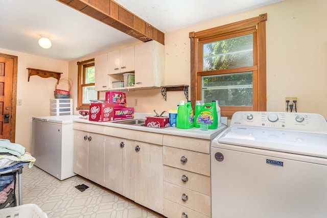 41793 Kilkenny Rd, Kilkenny, MN 56052 - washroom with washer / dryer, healthy amount of natural light, and cabinet space