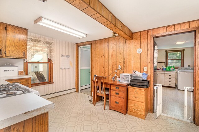 41793 Kilkenny Rd, Kilkenny, MN 56052 - home office featuring washer / clothes dryer, light flooring, baseboard heating, and wood walls