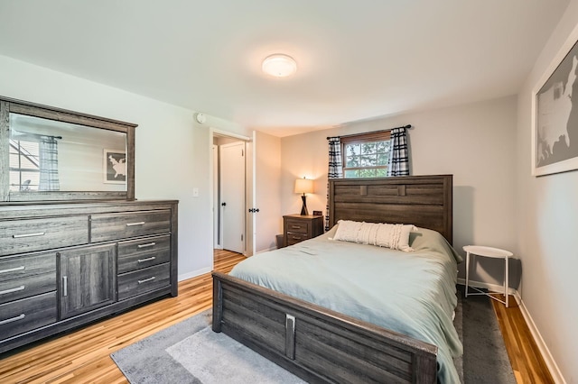 457 108th Ln NW, Coon Rapids, MN 55448 - bedroom with light wood-type flooring