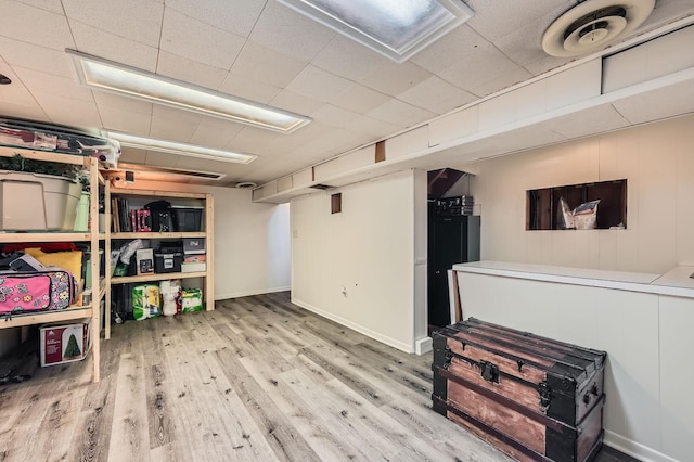 457 108th Ln NW, Coon Rapids, MN 55448 - finished basement featuring wood finished floors and baseboards