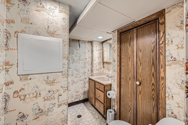457 108th Ln NW, Coon Rapids, MN 55448 - bathroom with wallpapered walls, vanity, recessed lighting, and tile patterned flooring
