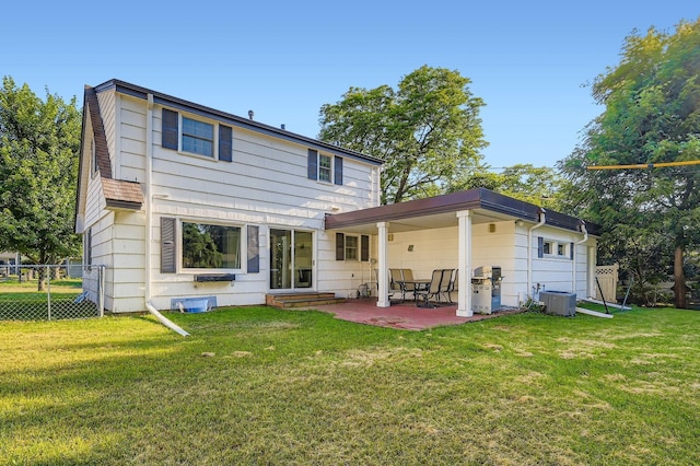 457 108th Ln NW, Coon Rapids, MN 55448 - rear view of house featuring a patio area and entry steps